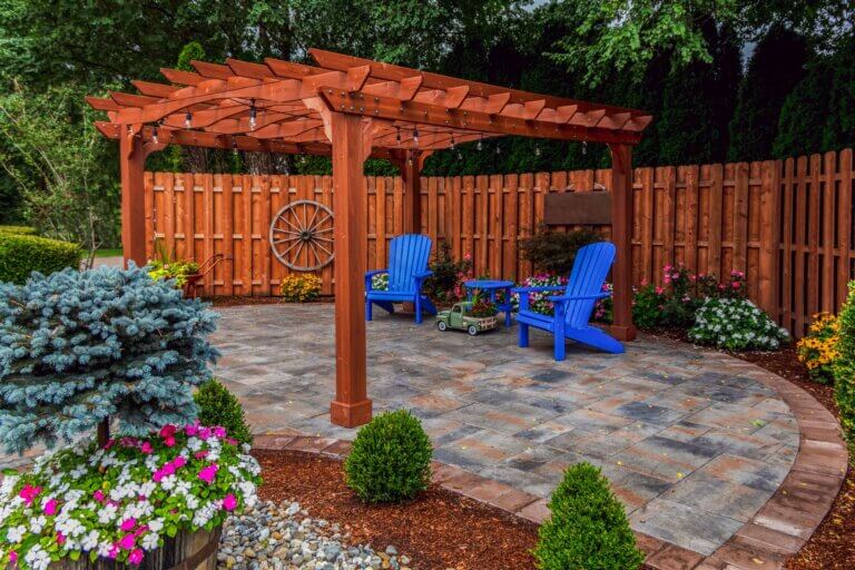 Cedar pergola over a paver patio